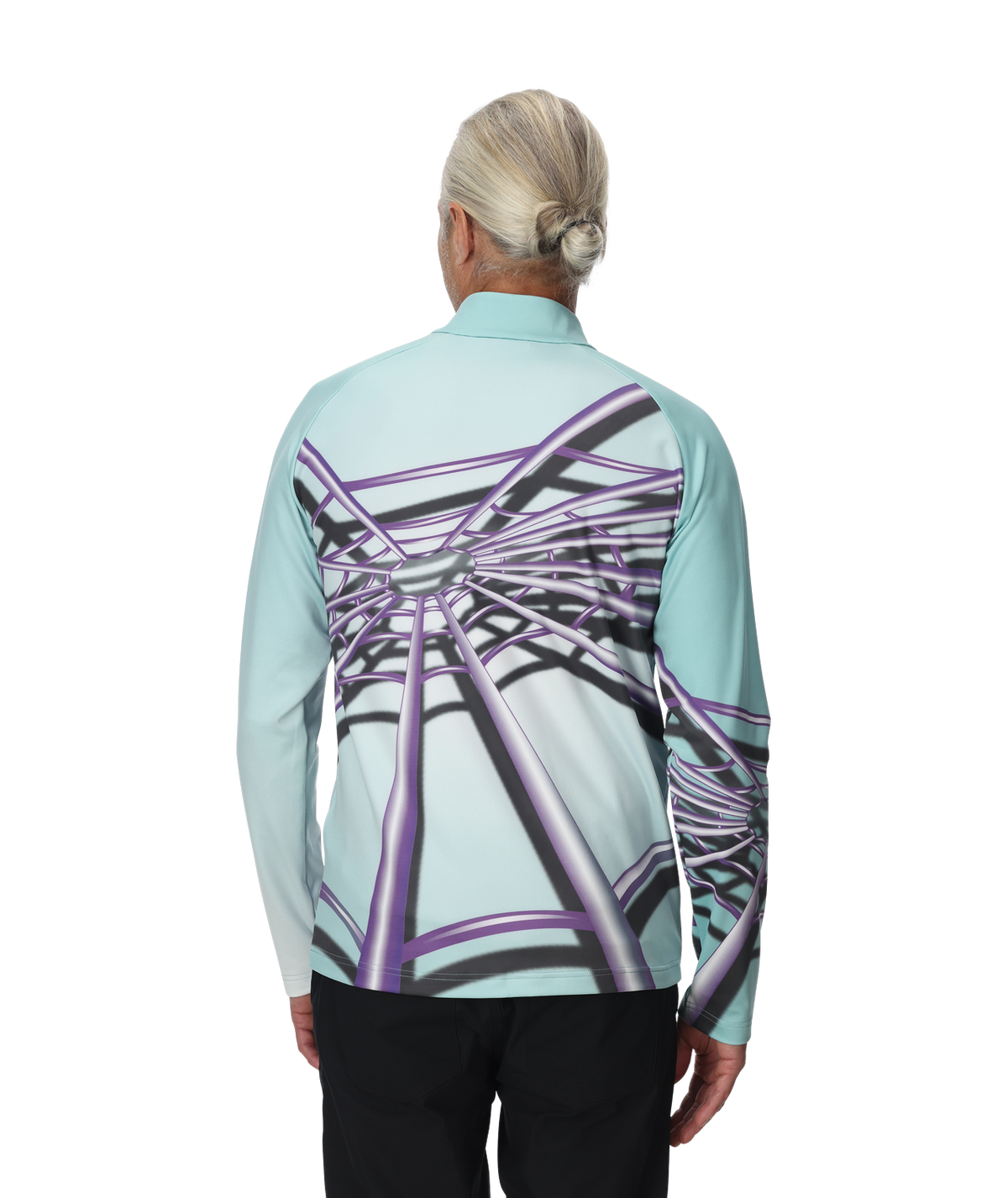 Person wearing a light blue long-sleeve shirt with a geometric pattern on the back, standing against a white background.