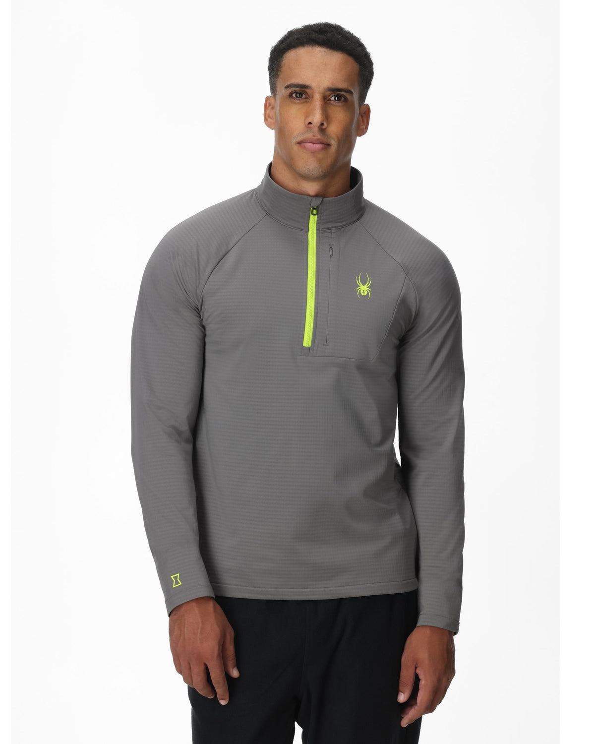 Man wearing a gray quarter-zip pullover with a logo on a white background