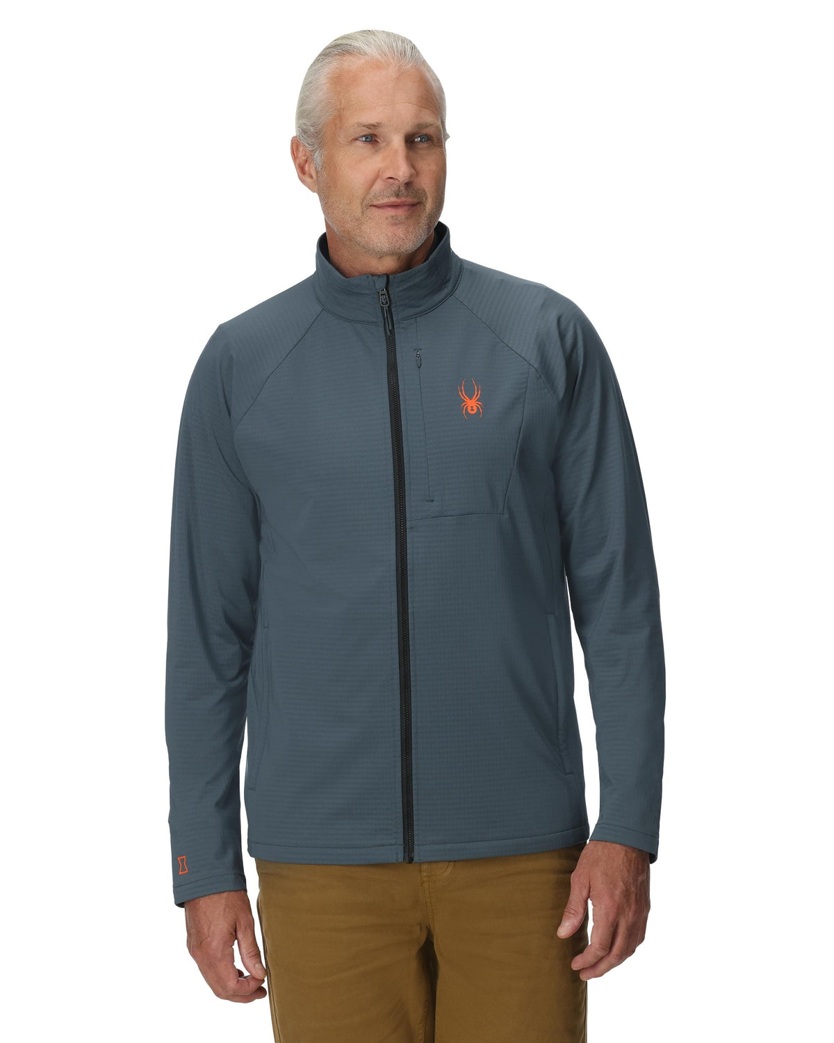 Man wearing a gray jacket with a logo on a white background