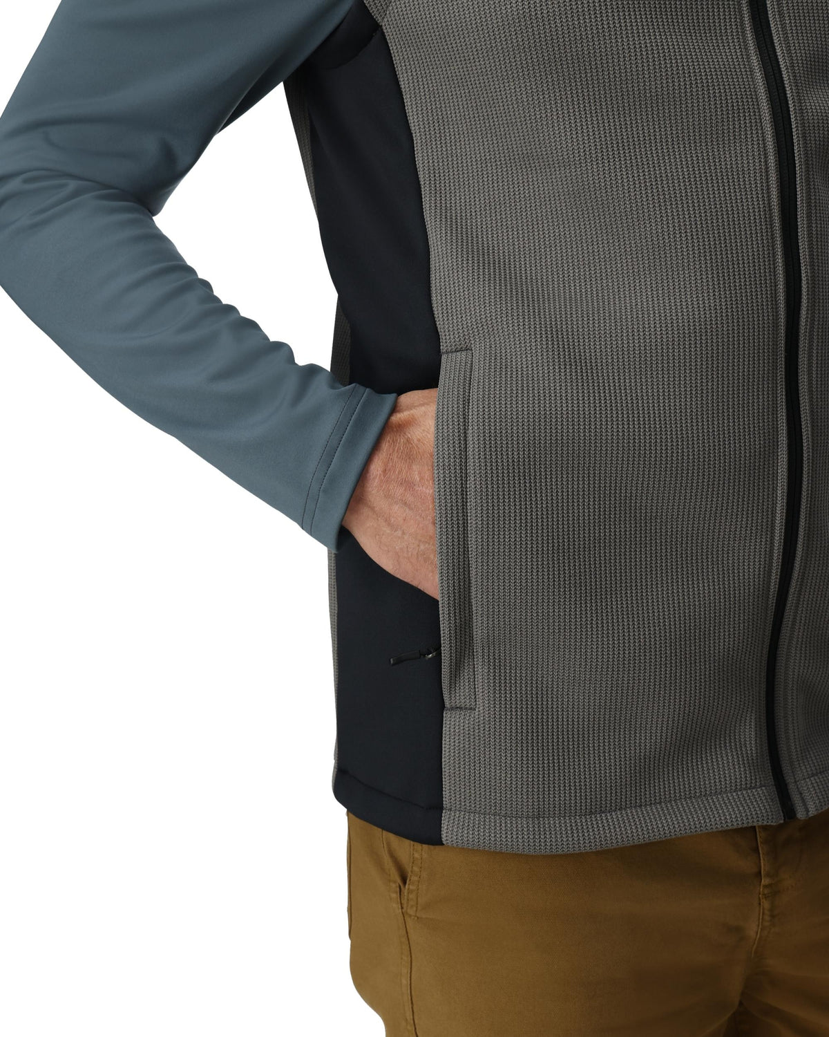 Gray jacket with a blue sleeve and brown pants on a white background