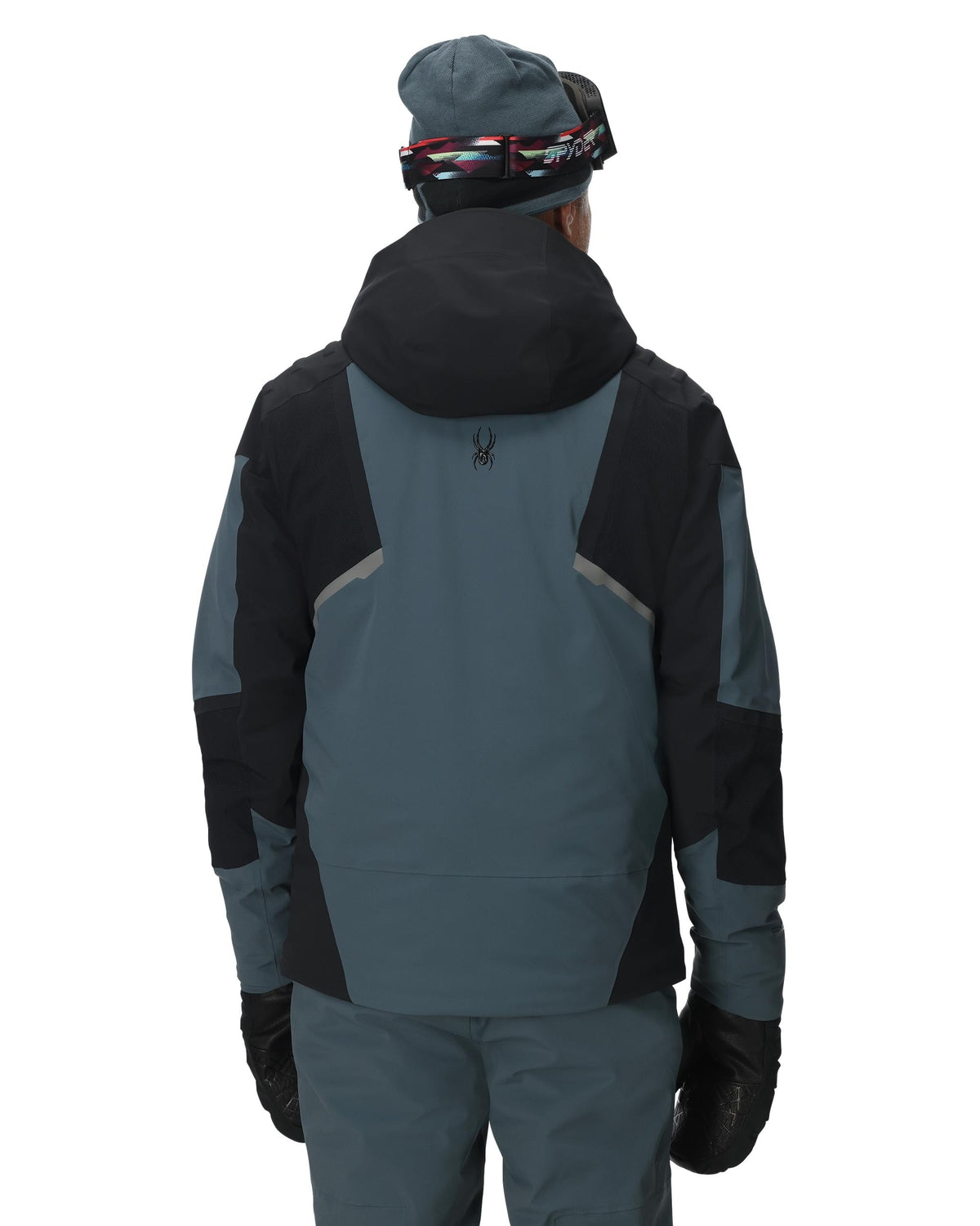 Person wearing a black and gray jacket with a hood on a white background