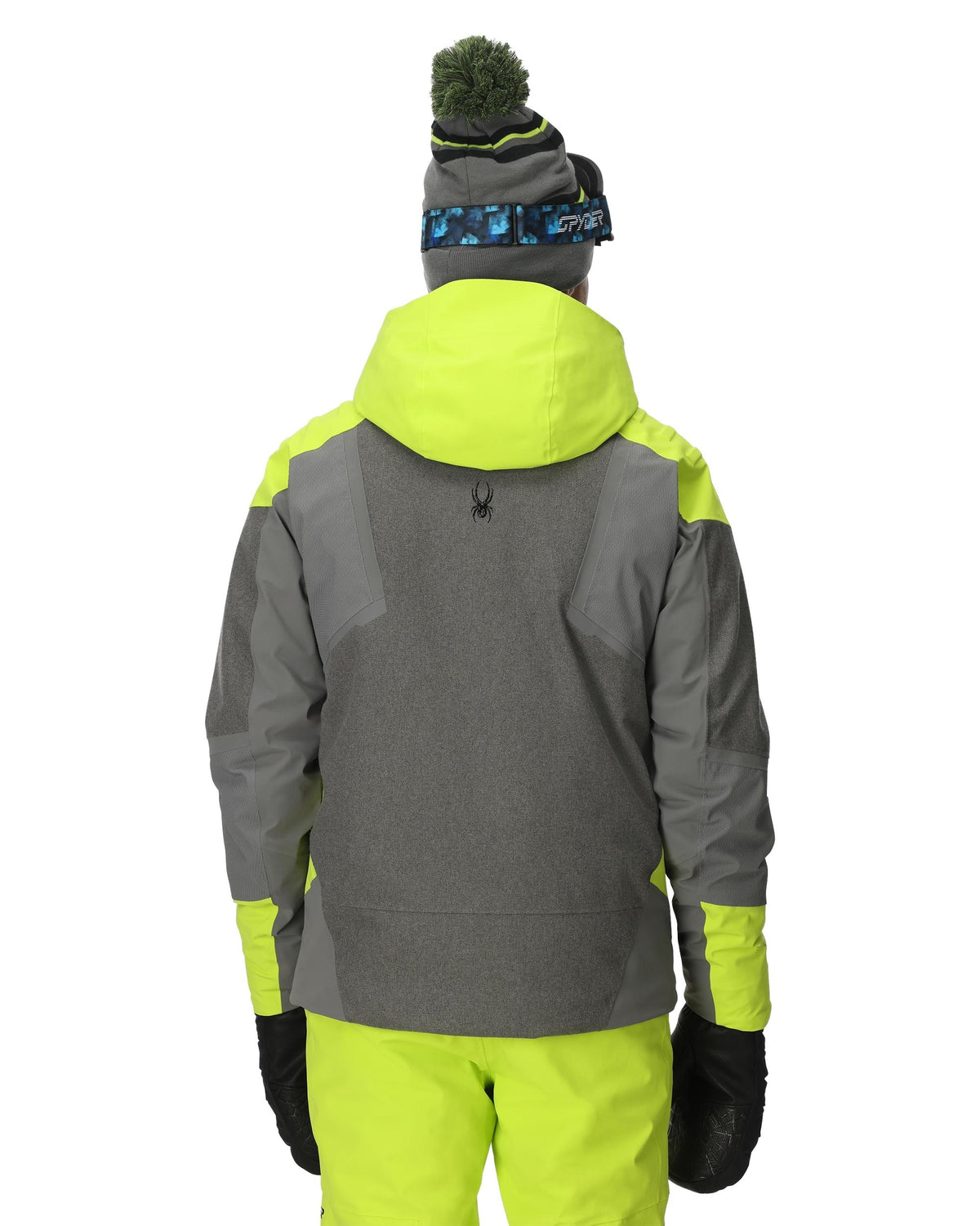 Person wearing a gray and neon green jacket with a matching hat and pants on a white background