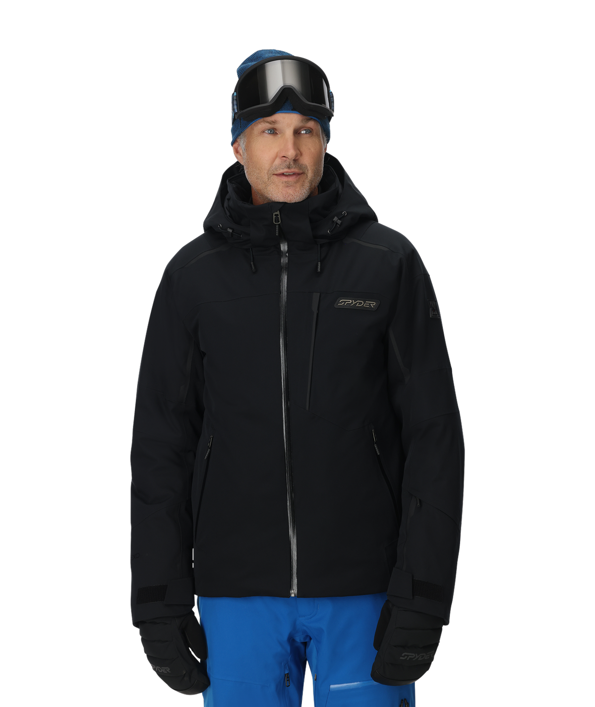 Man wearing a black ski jacket and blue pants on a white background