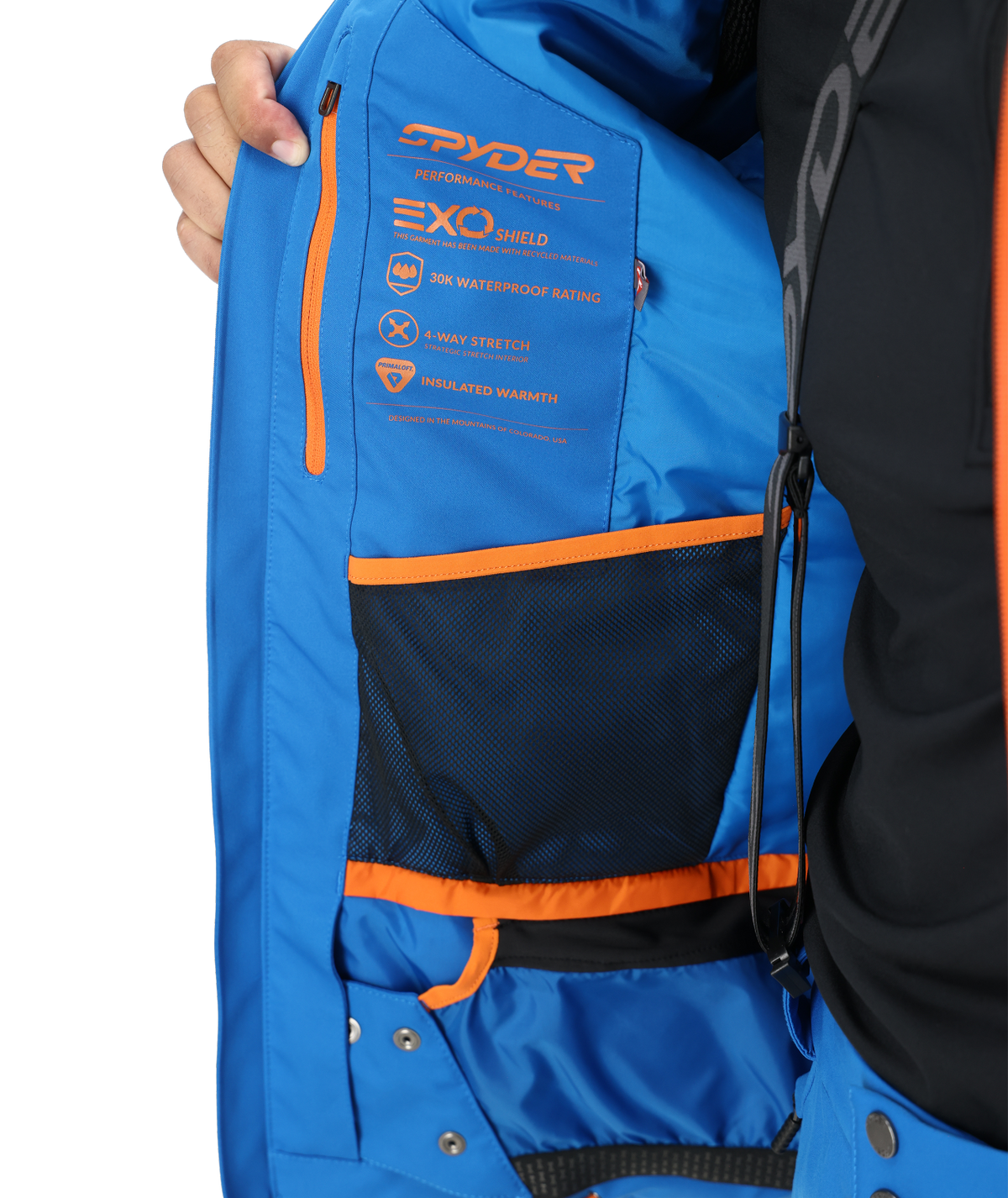 Blue ski bag with orange accents and Spyder branding on a white background
