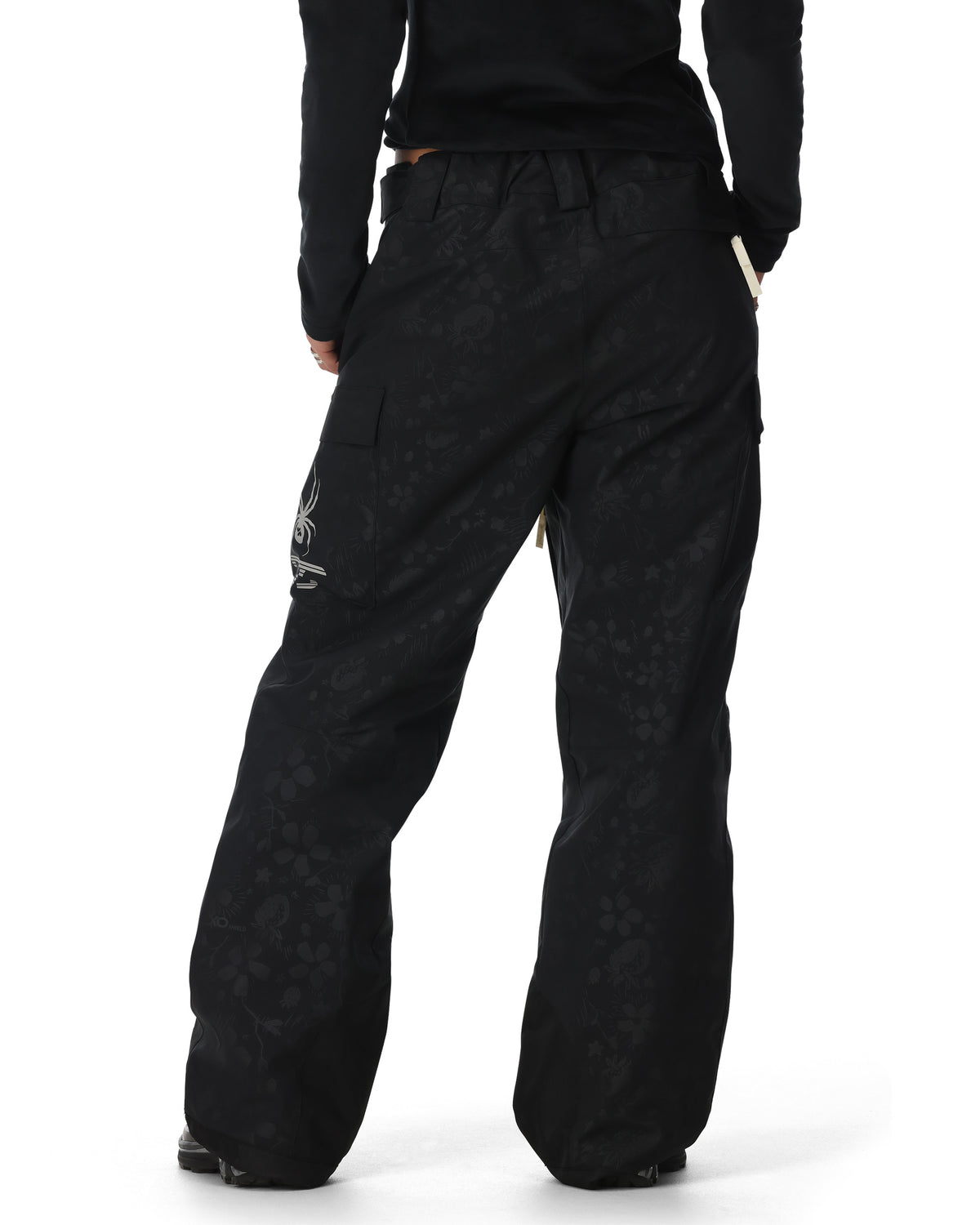 Black snow pants with a pattern on a white background