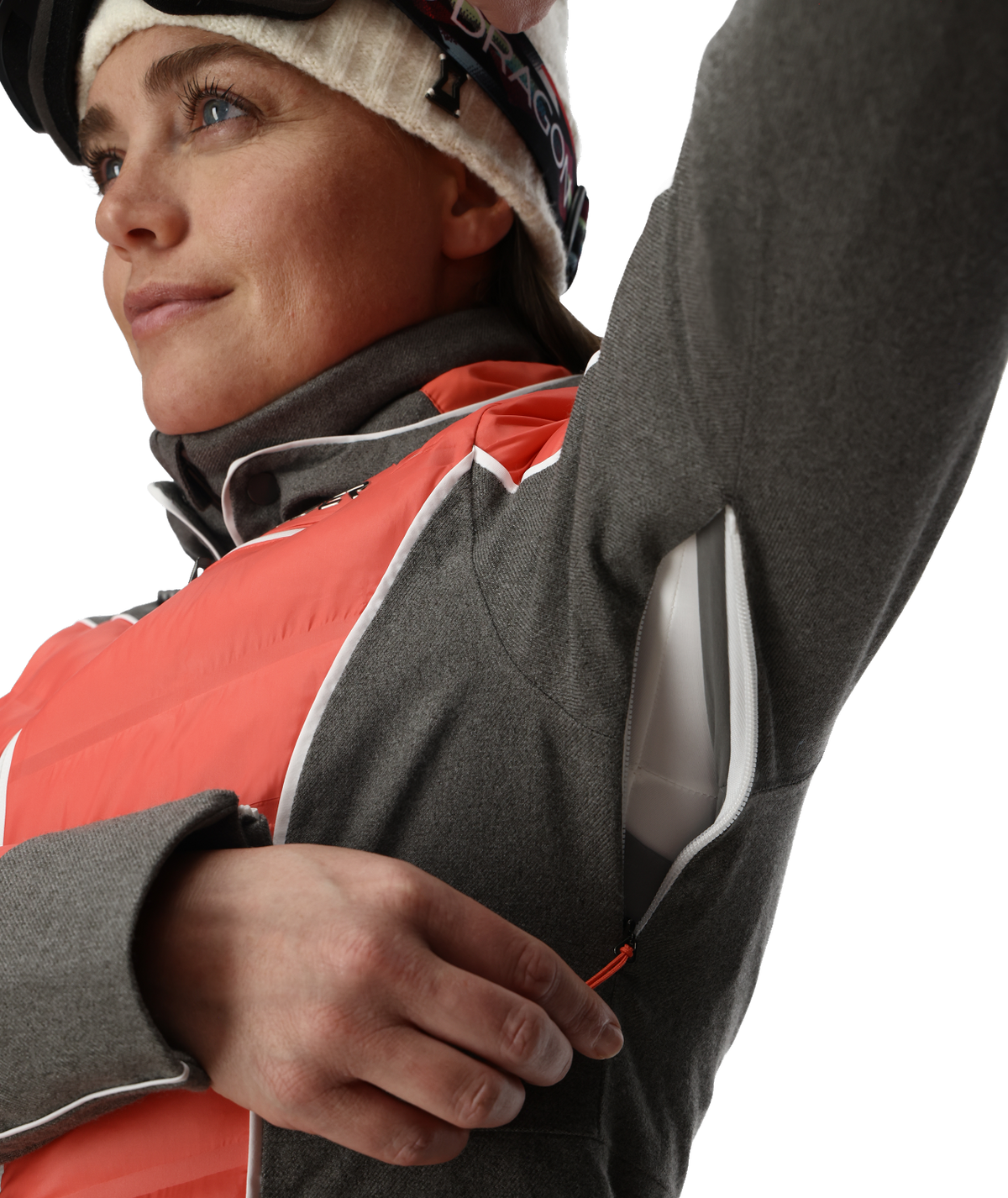 Person wearing a gray and red jacket with a white background