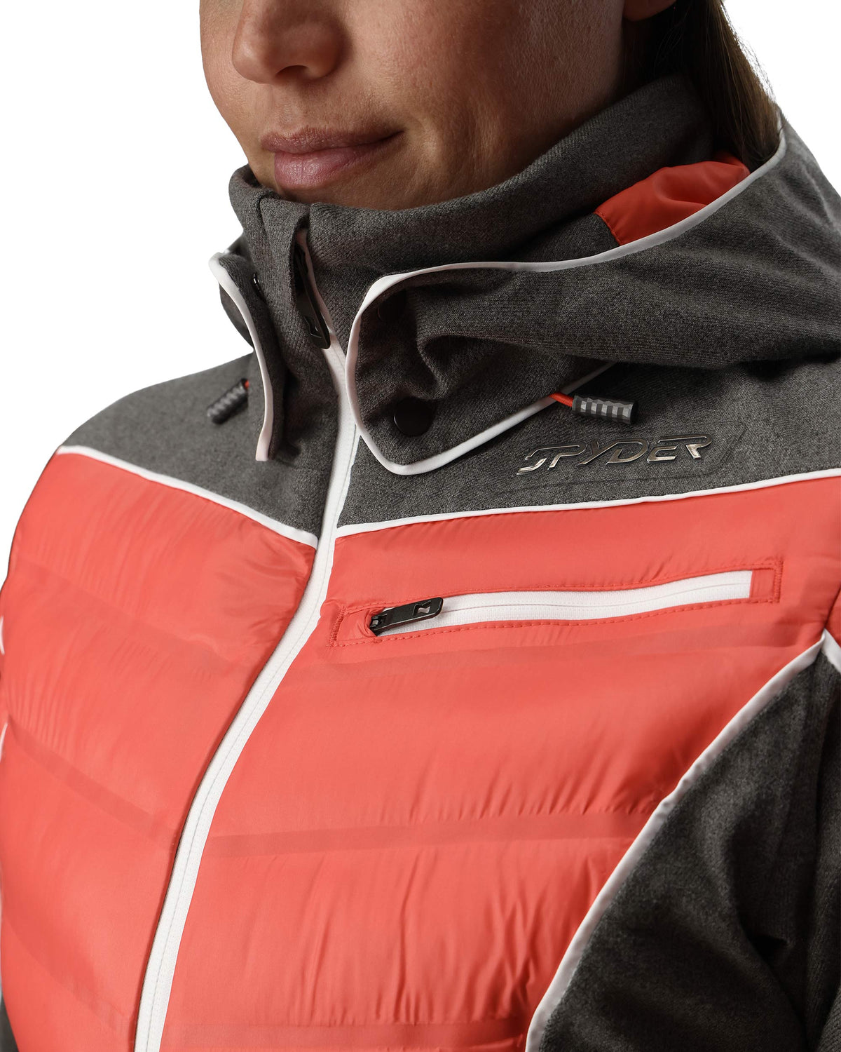 Close-up of a person wearing a red and gray jacket with a brand logo.
