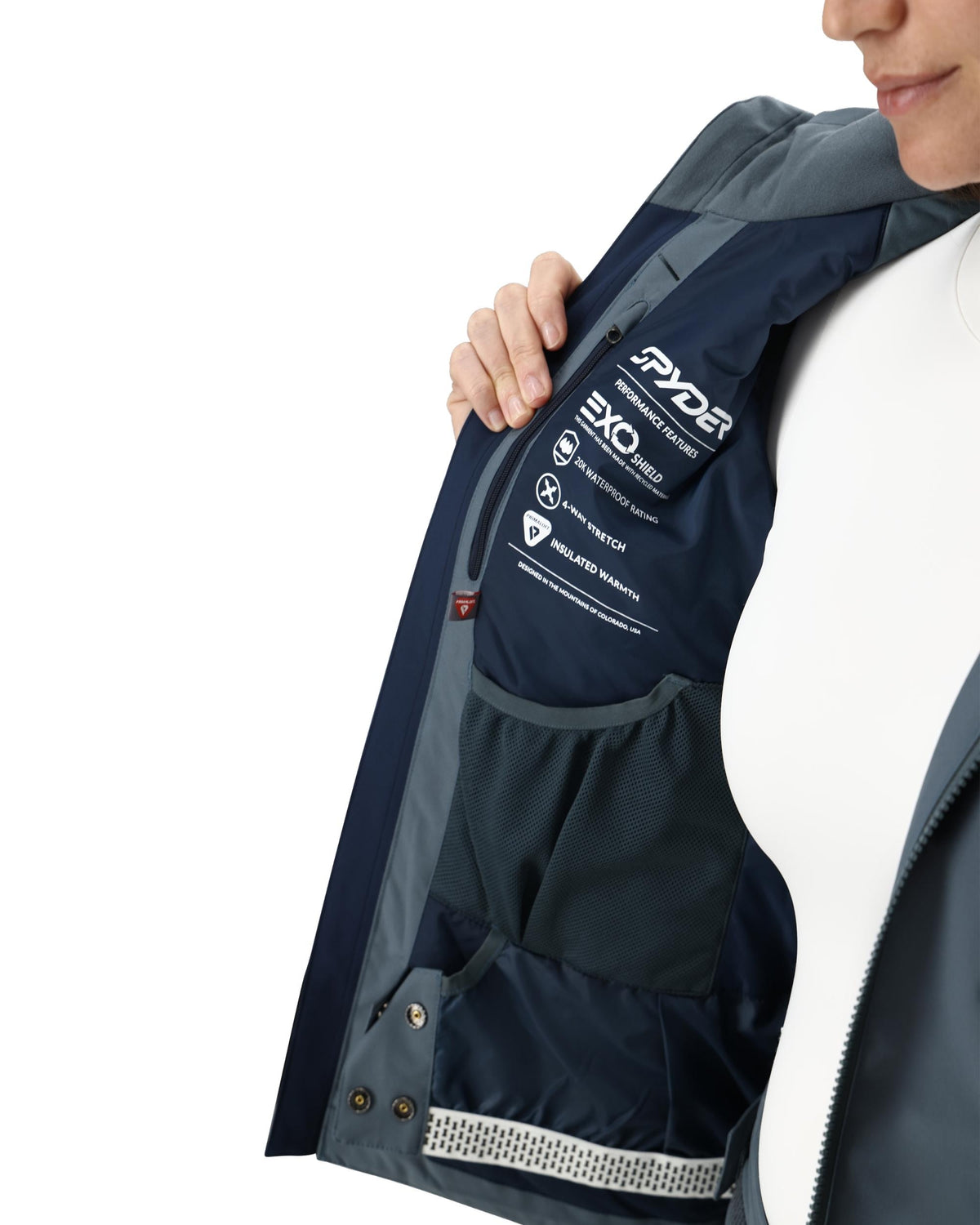 Navy jacket with visible branding on a white background