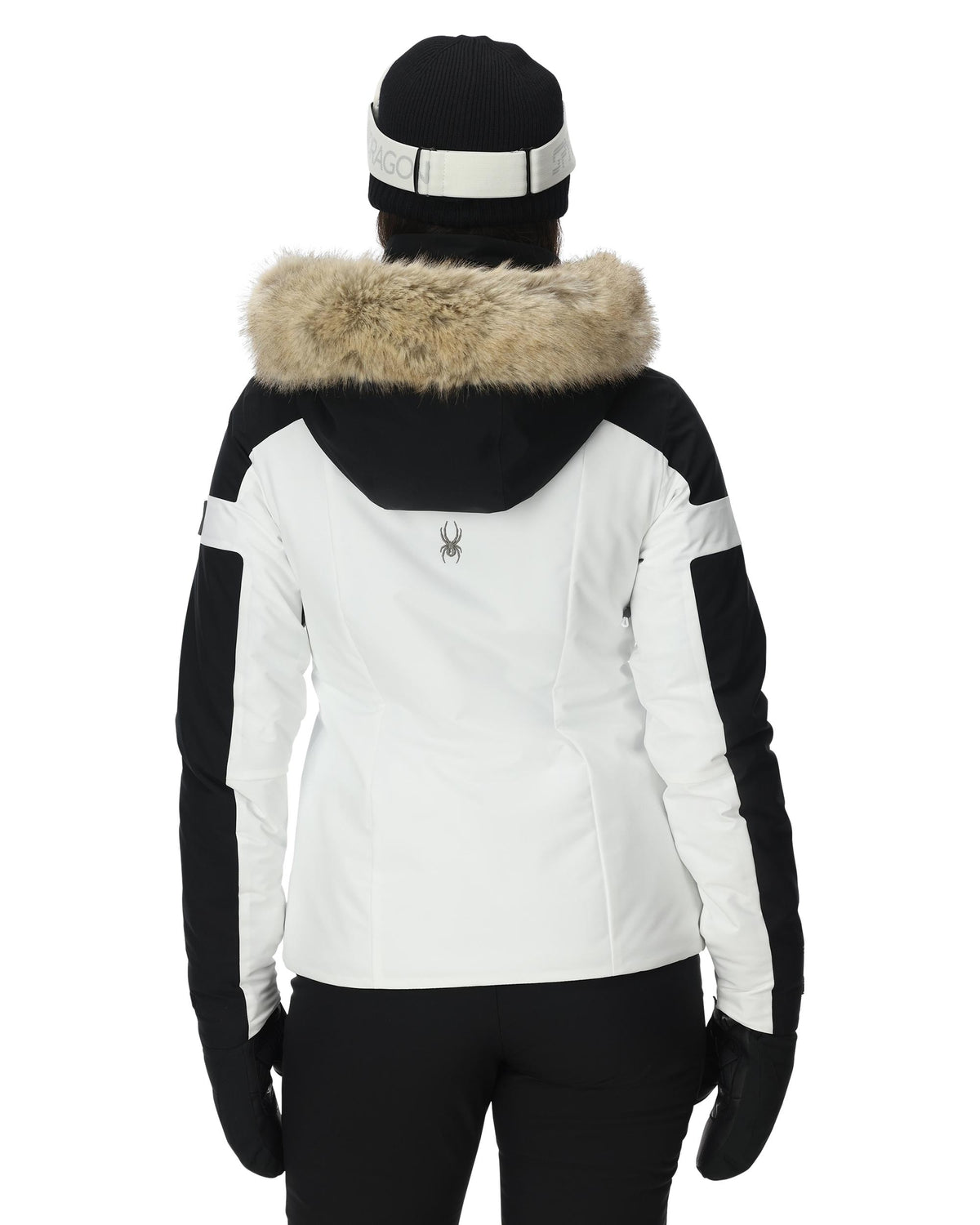 White winter jacket with black accents and fur hood on a white background