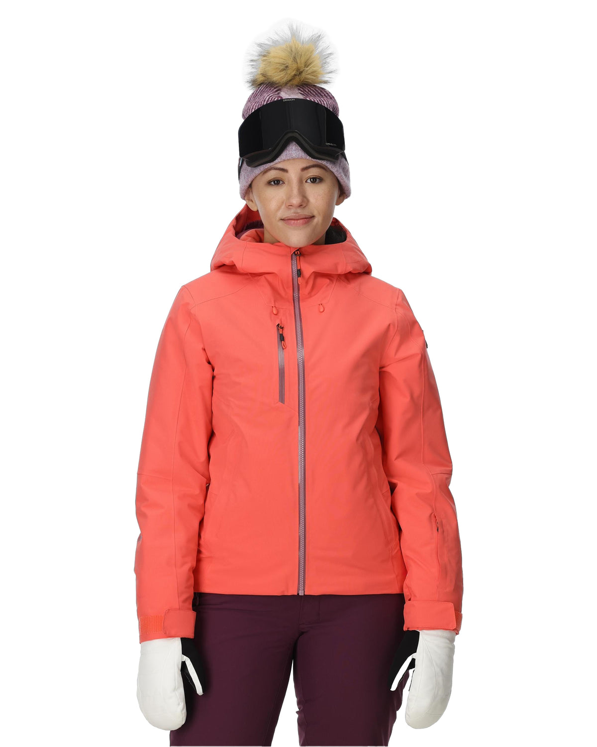 Person wearing a coral pink jacket with a white background