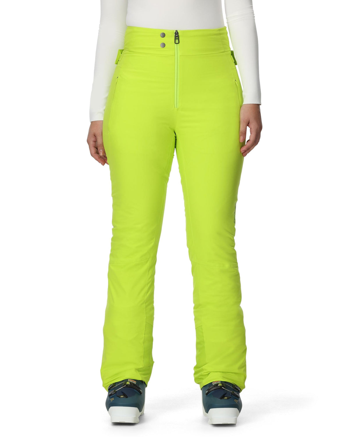 Bright green ski pants worn by a person on a white background