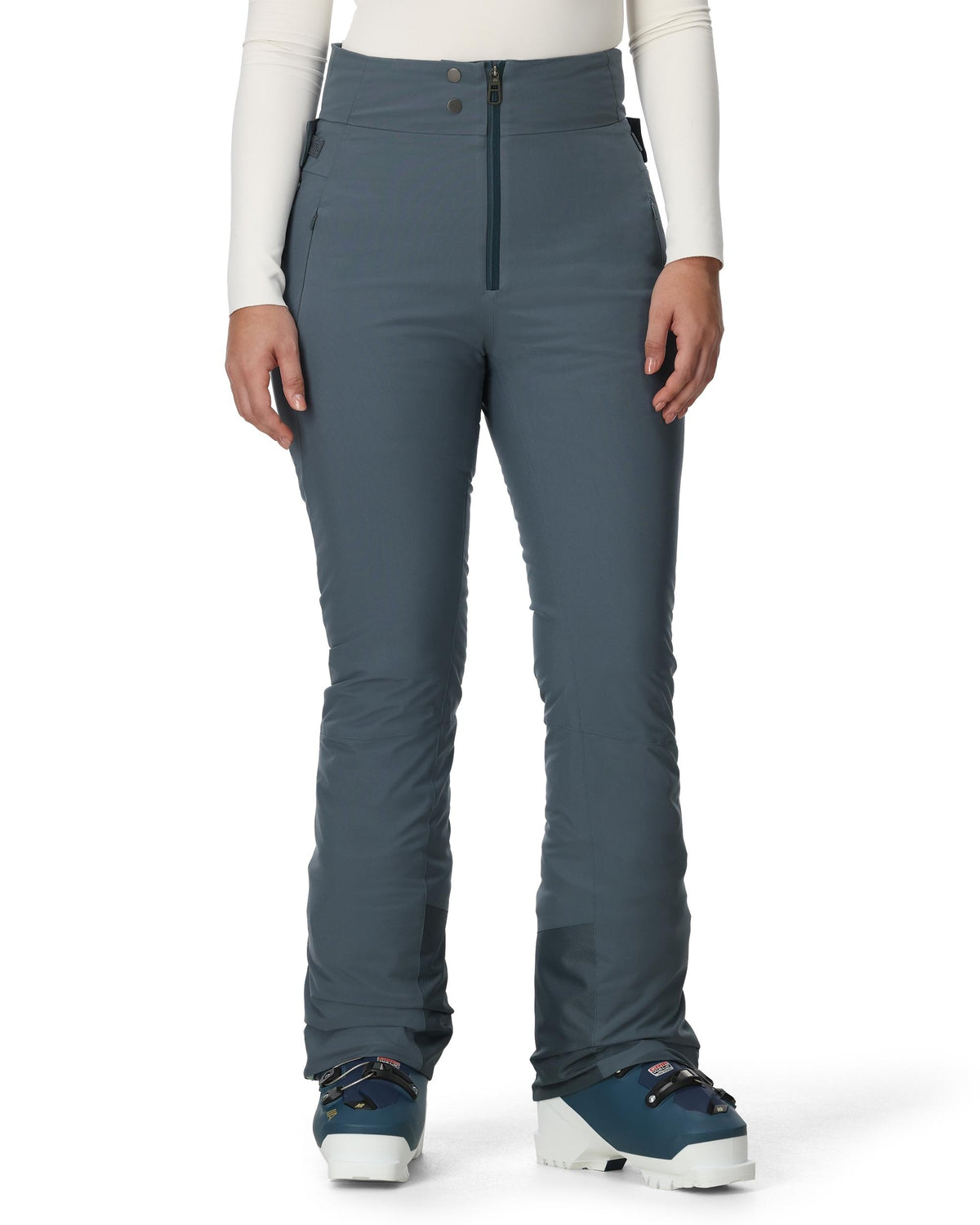 Blue ski pants worn by a person on a white background