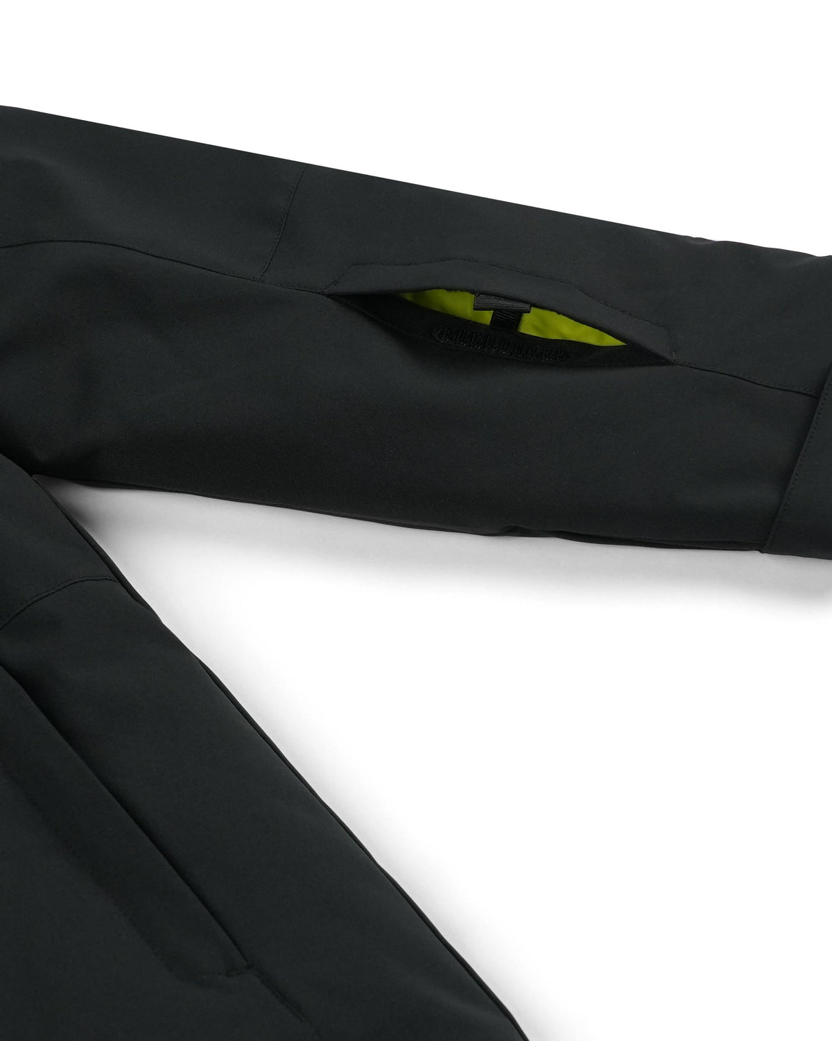 Close-up of a black jacket with a white background