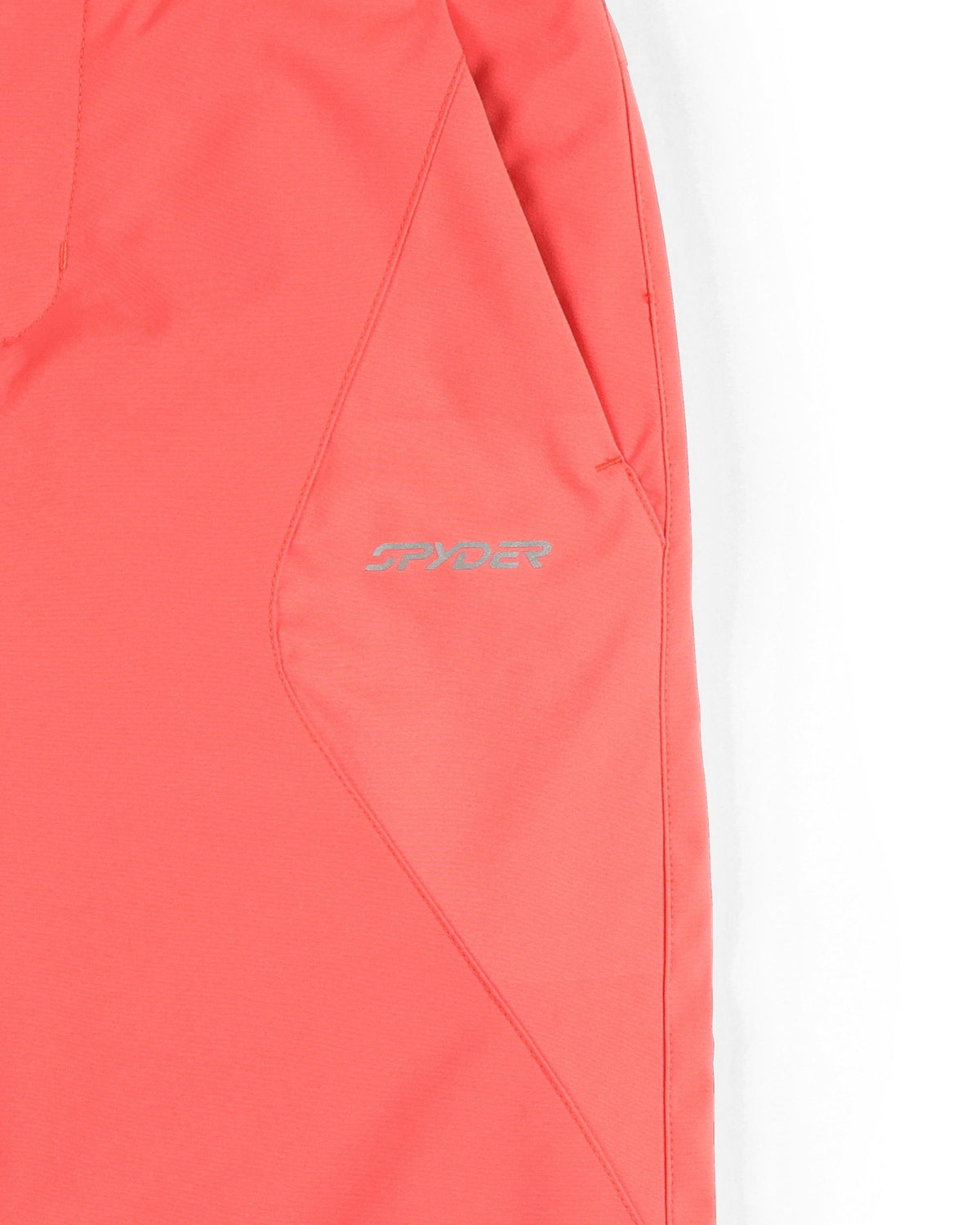 Close-up of a red jacket with a brand logo on a white background