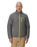 Man wearing a gray quilted jacket with yellow zippers on a white background