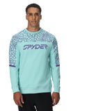 Man wearing a light blue sweater with geometric patterns and a brand logo on a white background