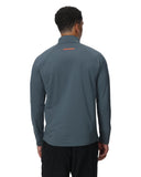 Person wearing a gray long-sleeve shirt with a brand logo on the back against a white background