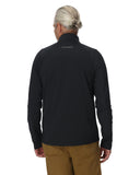 Person wearing a black quarter-zip pullover with a visible brand logo on the back, standing against a white background.