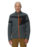 Man wearing a gray and black jacket with orange accents on a white background