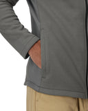 Close-up of a gray textured jacket with a person wearing it, focusing on the sleeve and chest area.