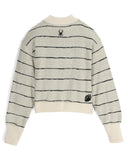Striped sweater with embroidered designs on a white background