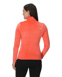 Person wearing a coral long-sleeve athletic top on a white background