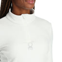 White fleece long sleeve with a quarter zip and Spyder logo. 