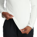 White fleece long sleeve with a quarter zip and Spyder logo. 