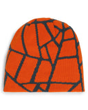 Orange beanie with black geometric pattern on a white background