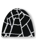 Black and white patterned beanie on a white background