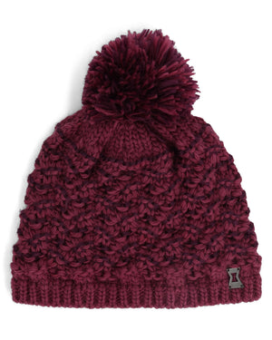 Maroon knit beanie with pom-pom on a white background
