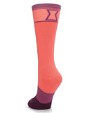 Pink and purple sock with a geometric pattern on a white background