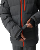 Person wearing a dark gray winter jacket with a red zipper on a white background