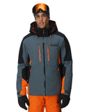 Person wearing a gray and orange ski jacket with goggles on a white background