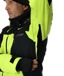 Person wearing a black and yellow jacket with 'Exped' branding on a white background