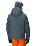 Person wearing a gray jacket and orange pants on a white background