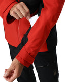 Red and black jacket with a person holding a white card.