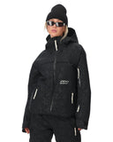 Person wearing a black snow jacket and pants with a white background