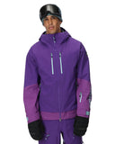 Person wearing a purple ski jacket and goggles on a white background