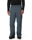 Person wearing blue pants with a black top on a white background