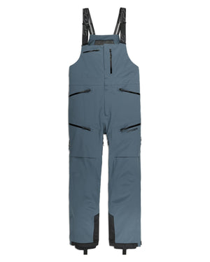 Blue bib overalls with black zippers and straps on a white background