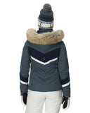 Blue winter jacket with fur hood and white pants on a white background