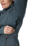 Person wearing a dark blue jacket with a white background