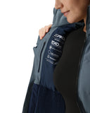 Person wearing a Spyder jacket with EXO technology on a white background