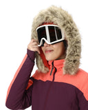 Person wearing a colorful winter jacket with a fur-lined hood and goggles on a white background