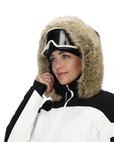 Person wearing a white and black winter coat with a fur-lined hood on a white background