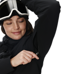 Person wearing a black jacket and helmet on a white background