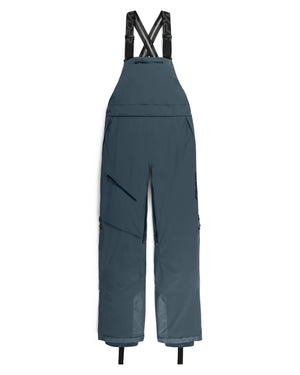 Blue bib overalls on a white background