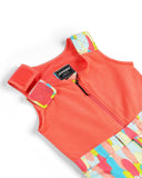 Orange life jacket with colorful design on a white background