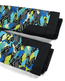 Colorful camouflage-patterned leggings with black edges on a white background